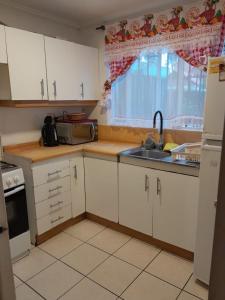 Η κουζίνα ή μικρή κουζίνα στο Puertas del mar +5 φωτογραφίες