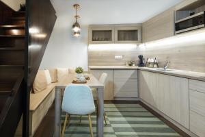 A kitchen or kitchenette at Budapest Downtown Museum Apartments