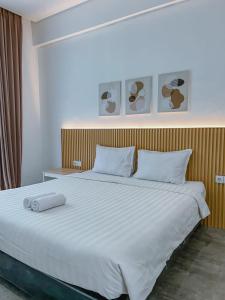 Postel nebo postele na pokoji v ubytování Olivia SOHO Guest House