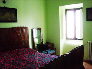 Giường trong phòng chung tại Casino Tonti Iarussi