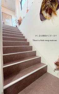 Imagine din galeria proprietății 民泊宿i s e s h i m a伊勢内宮前202猿田彦神社1分 în Ise
