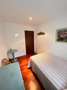 En eller flere senge i et værelse på Carmen Horcajo