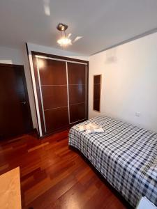 En eller flere senge i et værelse på Carmen Horcajo