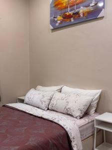 A bed or beds in a room at Lodging Mak Endon