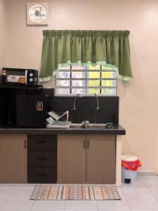 A kitchen or kitchenette at Lodging Mak Endon