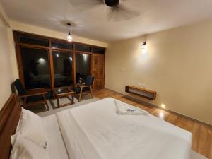 Postel nebo postele na pokoji v ubytování Diga vista resorts