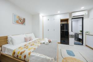 Postel nebo postele na pokoji v ubytování Label6 Coliving Rooftop Lakeview