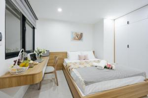 Postel nebo postele na pokoji v ubytování Label6 Coliving Rooftop Lakeview
