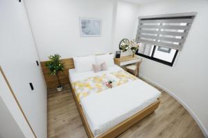 Postel nebo postele na pokoji v ubytování Label6 Coliving Rooftop Lakeview