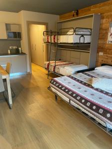 Letto o letti in una camera di Alpi Azzurre