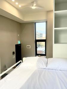 Postel nebo postele na pokoji v ubytování SSH ES Dream tower + 20 fotografií