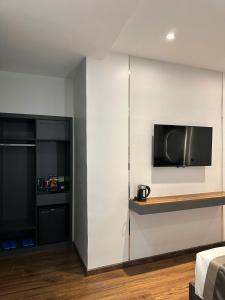 TV a/nebo společenská místnost v ubytování LION 11 Can Tho Hotel