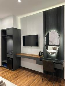 TV a/nebo společenská místnost v ubytování LION 11 Can Tho Hotel