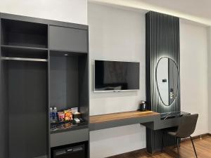 TV a/nebo společenská místnost v ubytování LION 11 Can Tho Hotel