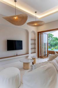 Postel nebo postele na pokoji v ubytování Maliya Villa by Betterplace