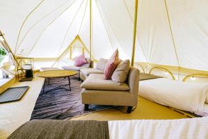 Postel nebo postele na pokoji v ubytování COUSCOUS Glamping Manazuru + 37 fotografií