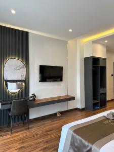 TV a/nebo společenská místnost v ubytování LION 11 Can Tho Hotel