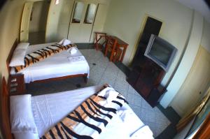 Voodi või voodid majutusasutuse Hostal Andry toas