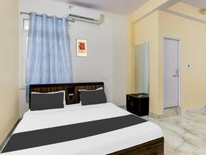 Postel nebo postele na pokoji v ubytování Hotel O Mellow Space
