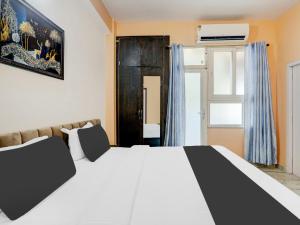 Postel nebo postele na pokoji v ubytování Hotel O Mellow Space