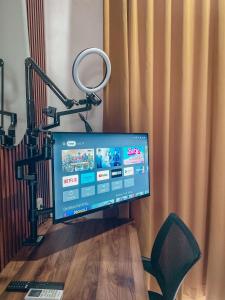 TV a/nebo společenská místnost v ubytování Olivia SOHO Guest House