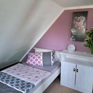 Ένα ή περισσότερα κρεβάτια σε δωμάτιο στο Dachstübchen