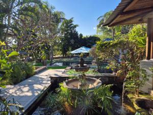Сад в Shanti Ghar Guest House