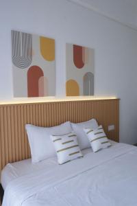 Postel nebo postele na pokoji v ubytování Olivia SOHO Guest House