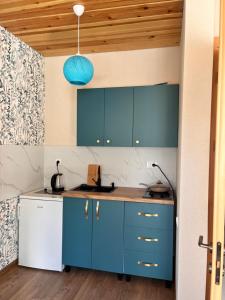 Kuchyň nebo kuchyňský kout v ubytování Apart-Hotel Seti
