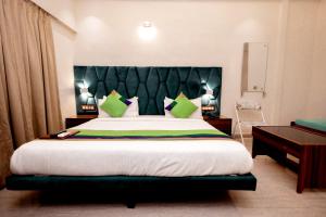 Postel nebo postele na pokoji v ubytování HOTEL GOLDEN TULIPZ
