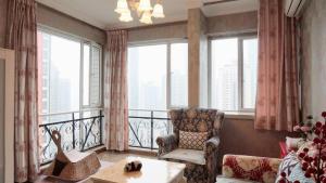 Xiao Yu Residential Apartment Near Jiefangbei and Hongya Cave的休息区