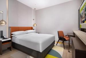 Voodi või voodid majutusasutuse Home2 Suite by Hilton Chongqing Wanzhou toas