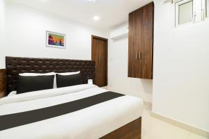 Postel nebo postele na pokoji v ubytování Super Hotel O Eminent Hotel