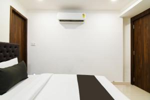 Postel nebo postele na pokoji v ubytování Super Hotel O Eminent Hotel