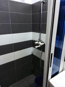 Koupelna v ubytování Crownedge Hotels