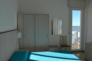 Postel nebo postele na pokoji v ubytování Hotel Caesar