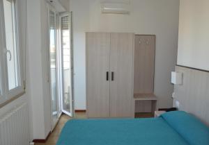 Postel nebo postele na pokoji v ubytování Hotel Caesar
