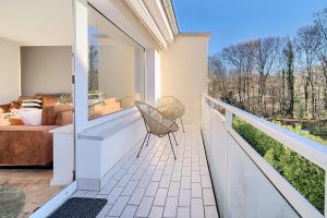Μπαλκόνι ή βεράντα στο WARMSTAY I Ferienunterkunft mit Balkon I Key-Box Check-In
