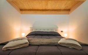 Katil atau katil-katil dalam bilik di Private Parking-Parthenope's House