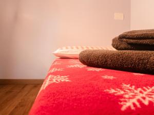 A bed or beds in a room at Maison Tatà