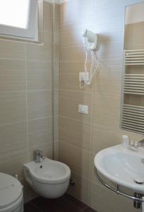Koupelna v ubytování Hotel Caesar