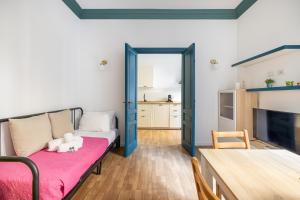 A bed or beds in a room at VATICAN COZY APARTMENT - GIULIANA