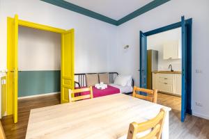 A bed or beds in a room at VATICAN COZY APARTMENT - GIULIANA