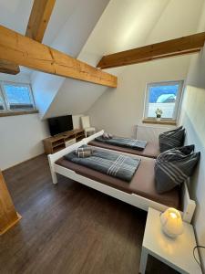 Televízia a/alebo spoločenská miestnosť v ubytovaní Haus Kampl - Appartement Grundlsee