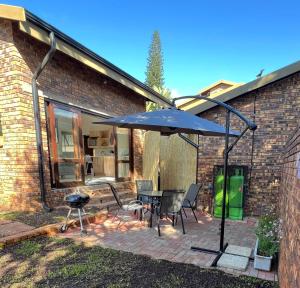 Patio nebo venkovní prostory v ubytování Levinia Cottage