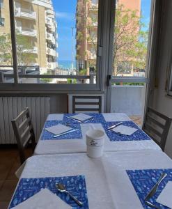 Postel nebo postele na pokoji v ubytování Hotel Caesar