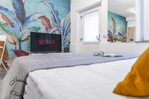 Postel nebo postele na pokoji v ubytování Maison Claude