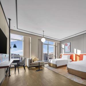 Postel nebo postele na pokoji v ubytování Hilton Garden Inn Beijing Yizhuang + 37 fotografií