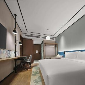 Postel nebo postele na pokoji v ubytování Hilton Garden Inn Beijing Yizhuang
