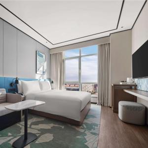 TV a/nebo společenská místnost v ubytování Hilton Garden Inn Beijing Yizhuang